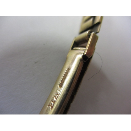 92 - A vintage 9ct gold cased EVERITE ladies watch, having integral gold strap, not tested as to function... 