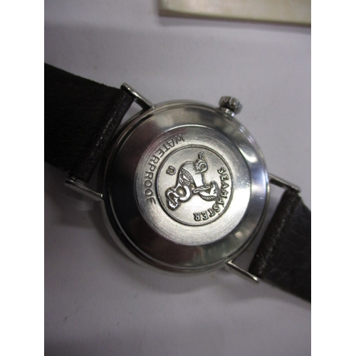 96 - A 1960s Omega Seamaster automatic watch with date window, runs with age related marks, paperwork but... 