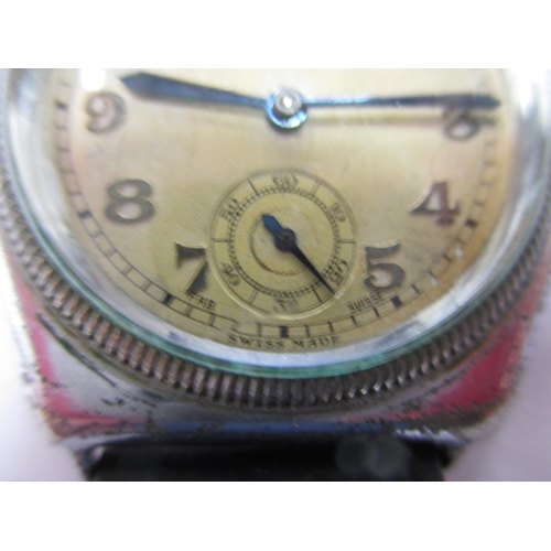 97 - A 1920s/30s gents Rolex Oyster cushion case wrist watch, runs when wound and with considerable use r... 