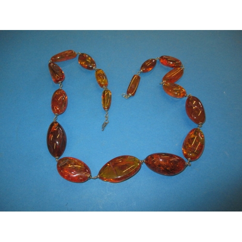 141 - A vintage natural amber necklace, verbally authenticated by the amber museum in Southwold, approx. g... 