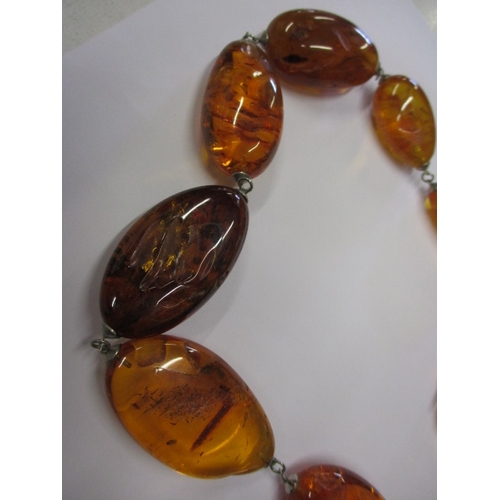 141 - A vintage natural amber necklace, verbally authenticated by the amber museum in Southwold, approx. g... 