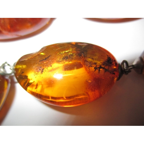 141 - A vintage natural amber necklace, verbally authenticated by the amber museum in Southwold, approx. g... 