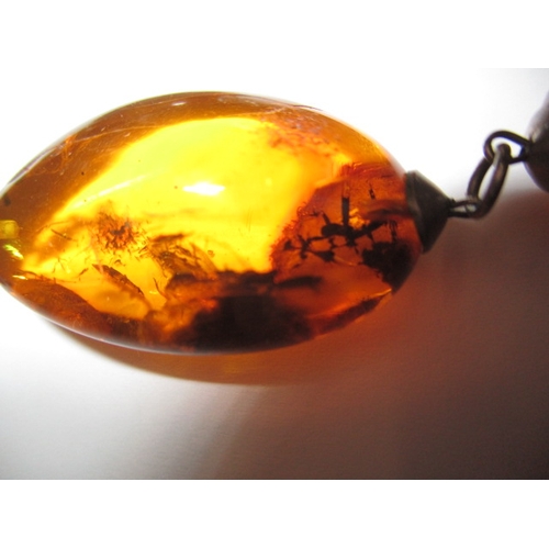 141 - A vintage natural amber necklace, verbally authenticated by the amber museum in Southwold, approx. g... 