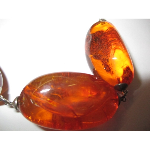 141 - A vintage natural amber necklace, verbally authenticated by the amber museum in Southwold, approx. g... 