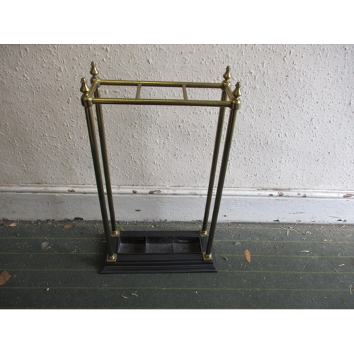 327 - A brass and iron 3 compartment stick stand in good pre-owned useable condition