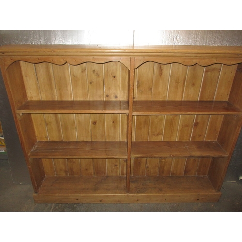 284 - A natural pine bookcase, good usable pre-owned condition. Approximate dimensions height 122cm, width... 