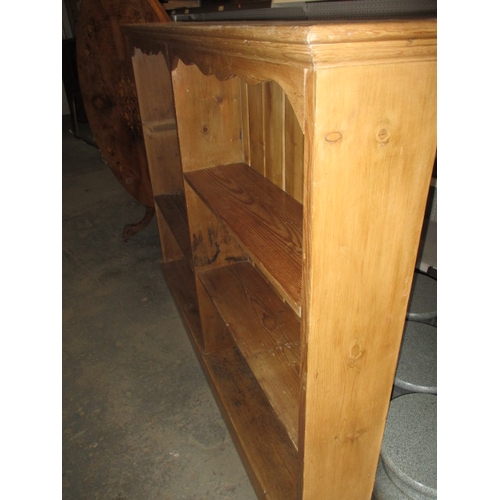 284 - A natural pine bookcase, good usable pre-owned condition. Approximate dimensions height 122cm, width... 