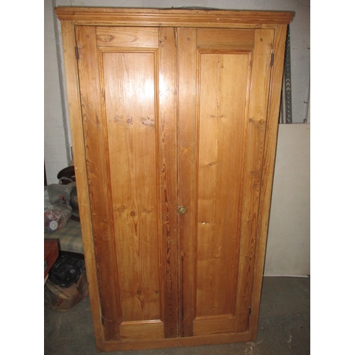 283 - A vintage double door, natural pine wardrobe with fitted shelving to interior. In useable, pre-owned... 