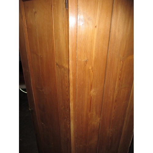 283 - A vintage double door, natural pine wardrobe with fitted shelving to interior. In useable, pre-owned... 