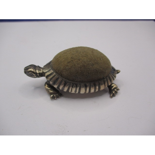 187 - A vintage sterling silver pin cushion in the form of a tortoise, in good used condition, approx. len... 