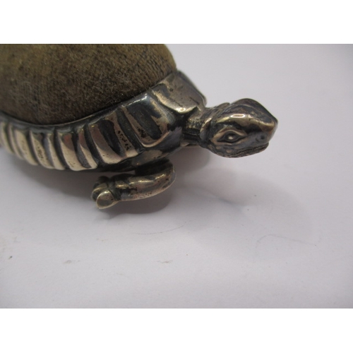 187 - A vintage sterling silver pin cushion in the form of a tortoise, in good used condition, approx. len... 