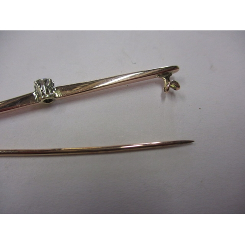 70 - An Edwardian 9ct rose gold bar brooch with central diamond, approx. weight 2.67g, in good pre-owned ... 