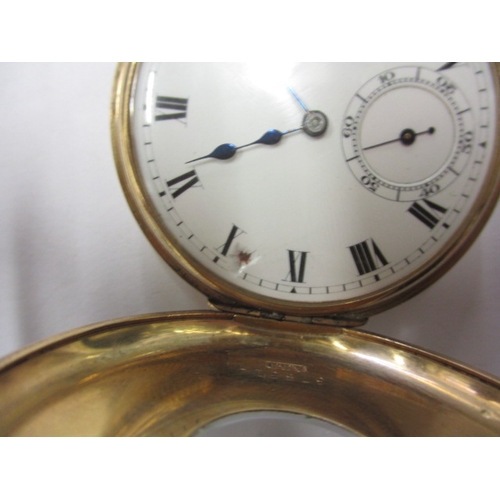 86 - A 9ct gold cased half hunter pocket watch, in used condition, runs when wound, small chip to dial ed... 