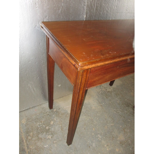 290 - A 19th Century mahogany fold-out tea table. In useable, pre-owned condition, with age related marks ... 