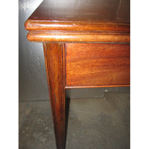 290 - A 19th Century mahogany fold-out tea table. In useable, pre-owned condition, with age related marks ... 