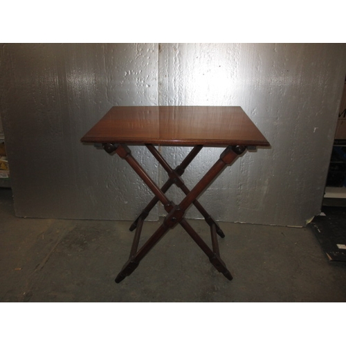 291 - An antique mahogany butler table. Lift off top and collapsible stand. Approximate height 85cm, width... 