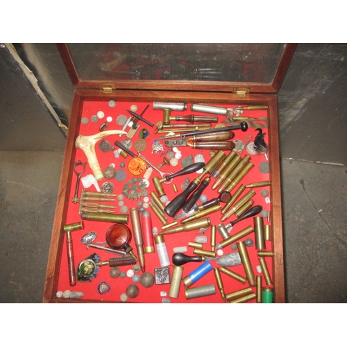 238 - A bijouterie case with contents of antique and later shooting related items. Case having added screw... 