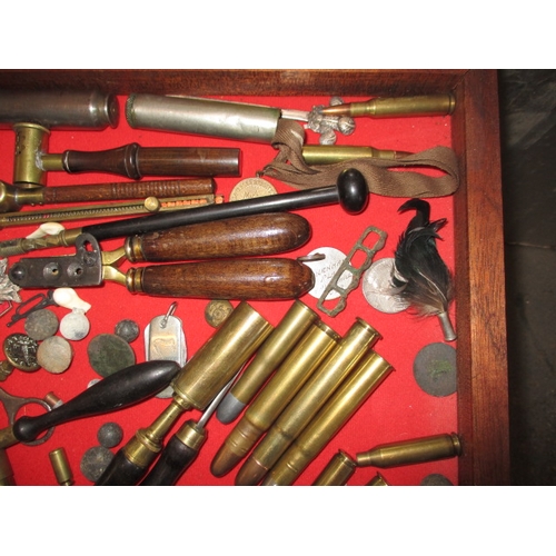 238 - A bijouterie case with contents of antique and later shooting related items. Case having added screw... 