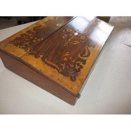 329 - A continental inlaid writing box, with fitted interior. General age related marks and repairs. Appro... 