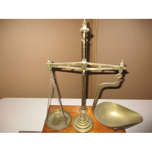 332 - A quantity of Victorian and later balance scales and weights. To include one example by Parnall & So... 