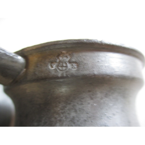 330 - A quantity of antique and later pewter tankards and measures. In good pre-owned condition