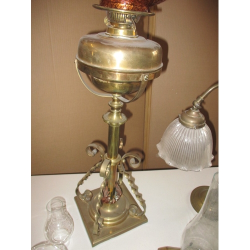 333 - A quantity of antique and later lamps, to include an art deco adjustable height table lamp. None tes... 