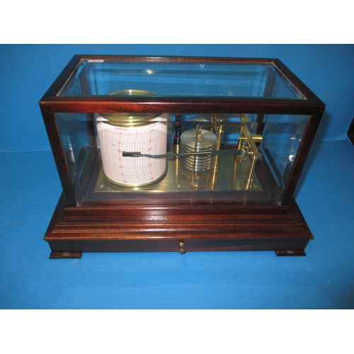 286 - A vintage barograph in mahogany glazed case, in working order with general use-related marks