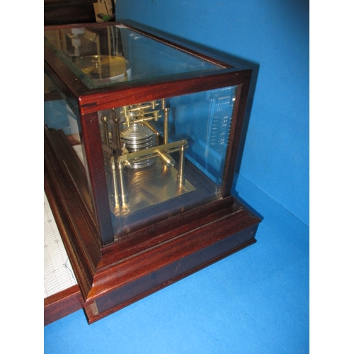 286 - A vintage barograph in mahogany glazed case, in working order with general use-related marks