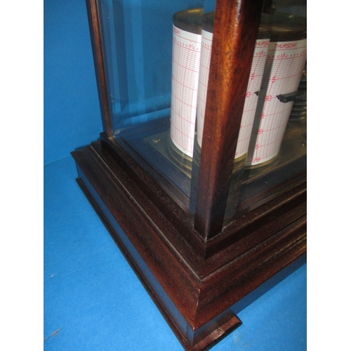 286 - A vintage barograph in mahogany glazed case, in working order with general use-related marks