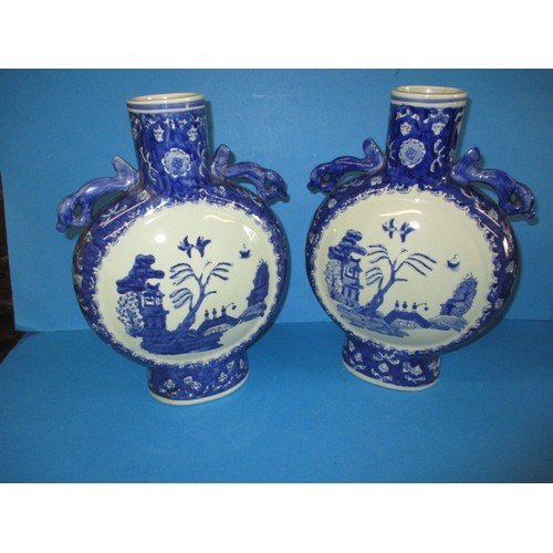 317 - Two vintage oriental ceramic moon flasks, each approx. 34cm high, both in good used condition with n... 