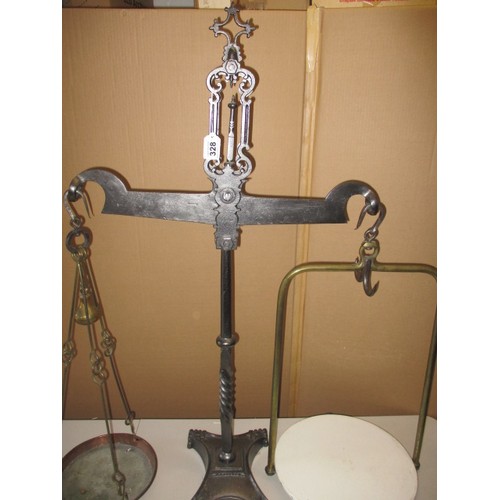 328 - A 19th Century cast iron shop balance scales with period weights, Victorian and Georgian stamps to w... 