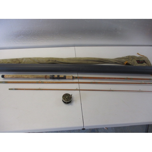 53 - A vintage Sealey Octopus split cane fishing rod, in near unused condition, approx. length 11ft,  and... 