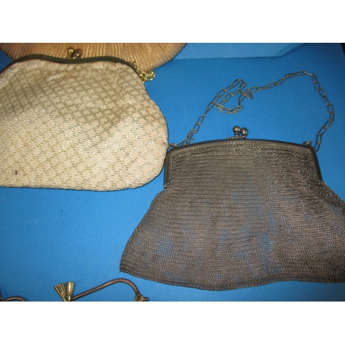 61 - A quantity of vintage evening bags, to include a white metal mesh example, all in used condition