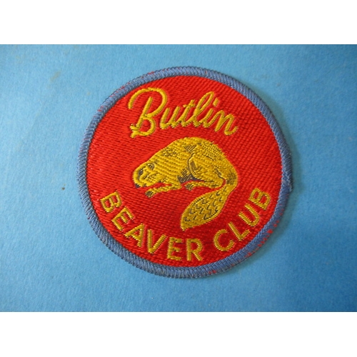 68 - A vintage Butlins holiday camp tin tray and a sew on badge, badge unused tray with general age-relat... 