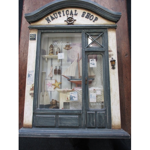 73 - A decorative Nautical Shop wall mounted diorama, approx. size 61x45cm, in useable pre-owned conditio... 