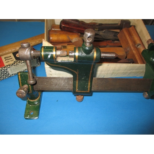 76 - A parcel of vintage tools, to include a bench top lathe and chisels and a good axe, all in used cond... 