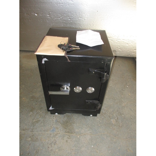 77 - A steel safe, in as new condition with keys and instruction booklet, approx. size Width 38cm Depth 3... 