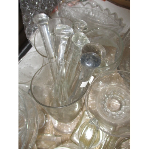 82 - A large quantity of antique and later glasswares, to include decanters and hand-blown drinking glass... 