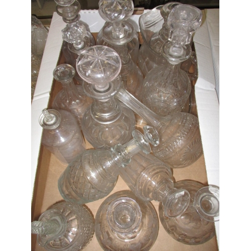 82 - A large quantity of antique and later glasswares, to include decanters and hand-blown drinking glass... 