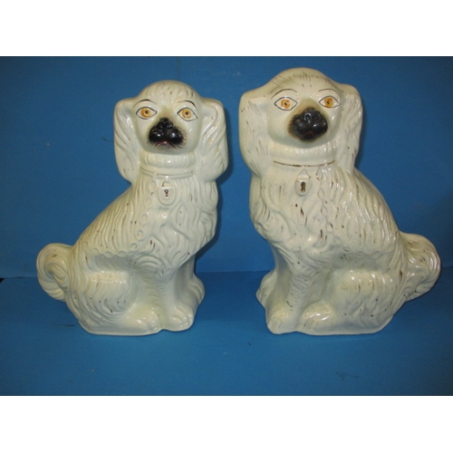 Two antique Staffordshire mantle dogs, approx. height 34cm, having no observed damage just use-related marks