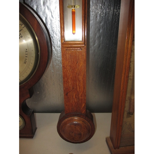 170 - 3 antique wood cased wall barometers and one later brass cased example. Non tested as to functioning... 