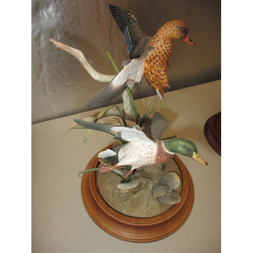 173 - A 1991 Franklin mint hand painted porcelain Pheasant, with no observed damage and another example of... 