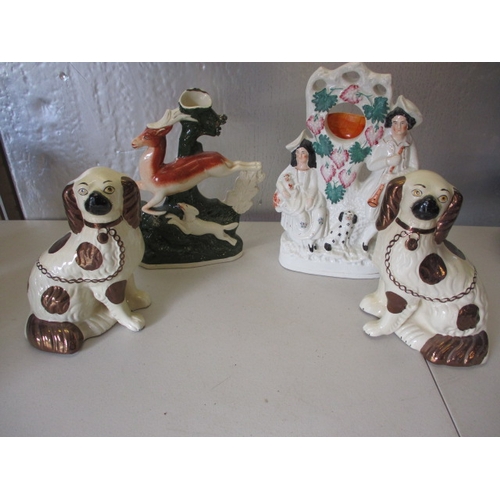 175 - 2 vintage Staffordshire flatbacks and a pair of mantle dogs. In good pre-owned condition