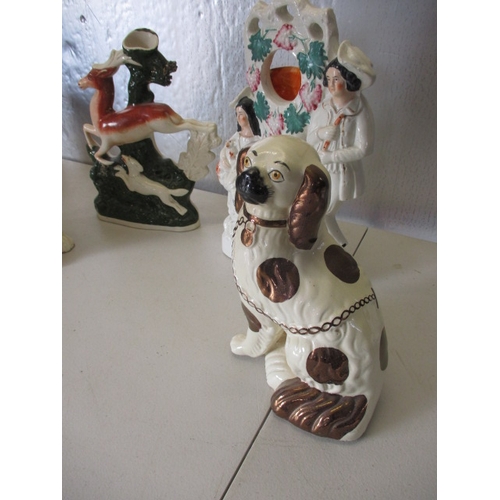 175 - 2 vintage Staffordshire flatbacks and a pair of mantle dogs. In good pre-owned condition