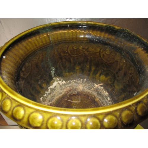 184 - A jardinière on stand and an art nouveau jardiniere. Both bowls having repairs