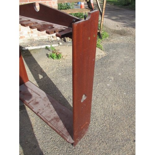 189 - A vintage mahogany 10 place gun rack. Age related marks and wear. Approximate width 97cm, height 100... 