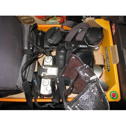 197 - A very large quantity of vintage cameras and accessories, to include A Zeiss Ikon baby box, 35mm rol... 