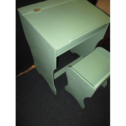 198 - A vintage child’s desk and stool, painted pale green and in useable pre-owned condition