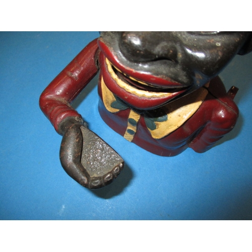 199 - A vintage cast iron mechanical money box, in good useable pre-owned condition, approx. height 16cm