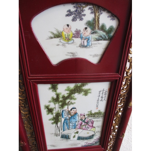 203 - Two vintage Chinese wood wall hangings with polychrome porcelain plaques, in good useable pre-owned ... 